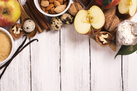 Apple pie ingrediens over white wooden background. Baking concept backgroundの写真素材