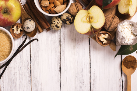 Apple pie ingrediens over white wooden background. Baking concept backgroundの写真素材