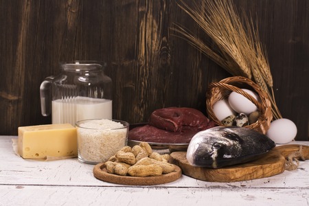 Healthy food, natural sources of protein over wooden table. Selective focusの写真素材