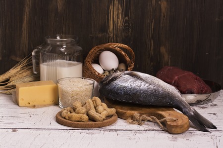Healthy food, natural sources of protein over wooden table. Selective focusの写真素材