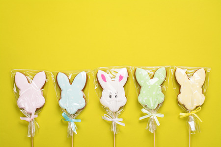 Easter bunnies. Gingerbread easter cookies in shape of bunny. Spring background. Space for text