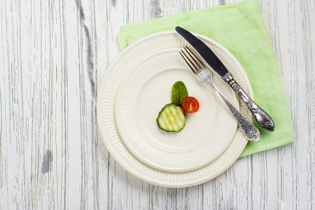 Small portion of food. Anorexia or unhealthy diet concept. Top viewの写真素材