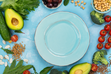 Healthy diet concept. Broccoli, lettuce, tomato, chickpeas, buckwheat on summer background. Space for textの写真素材