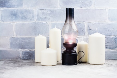 Christmas compositions with candles, holidays background. Space for textの写真素材