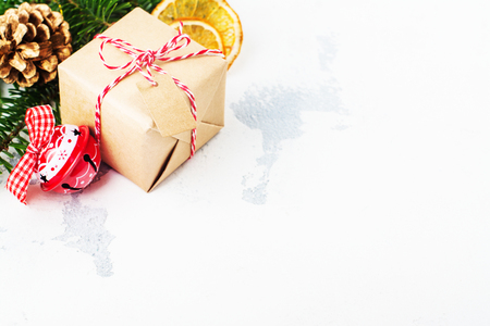 Christmas gift box on festive holiday background. Toned image. Christmas greeting card. Copy spaceの写真素材