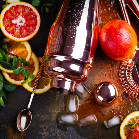 Bar accessories, drink tools and cocktail ingredients on rusty stone table. Flat lay styleの写真素材