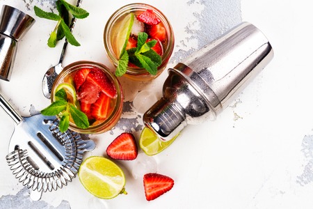 Refreshing summer sangria with strawberry and limeの写真素材