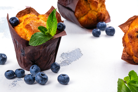Vegan banana oatmeal muffins with blueberry. Blueberry cupcakes on white background. Copy spaceの写真素材