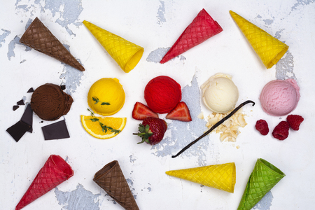 Chocolate, orange, strawberry, vanilla and raspberry ice creamの写真素材