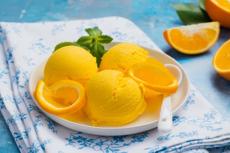 Orange ice cream. Summer orange sorbetの写真素材