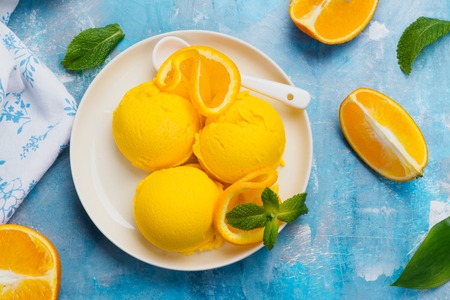 Orange ice cream. Summer orange sorbetの写真素材