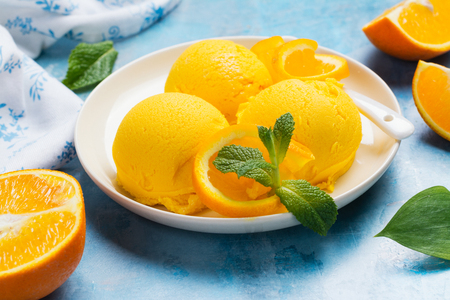 Orange ice cream. Summer orange sorbetの写真素材