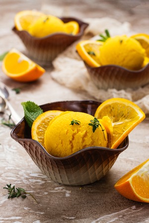Orange ice cream. Summer orange sorbetの写真素材