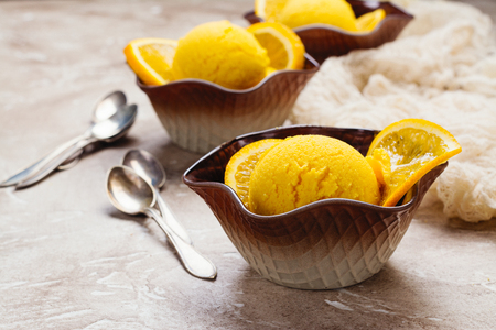 Orange ice cream. Summer orange sorbetの写真素材