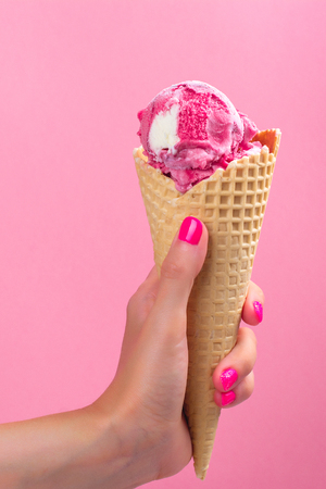 Woman hand holding ice creamの写真素材