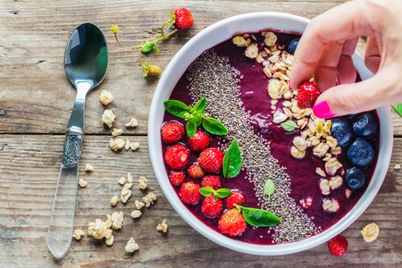 Berry purple smoothie bowlの写真素材