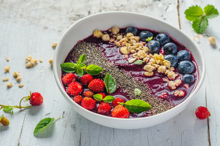 Berry purple smoothie bowlの写真素材