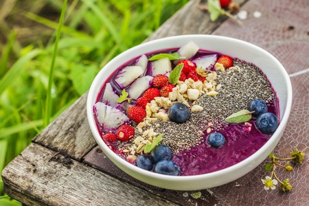 Berry purple smoothie bowlの写真素材