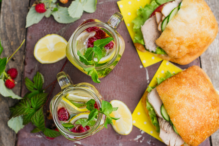 Lemonade and turkey sandwichesの写真素材