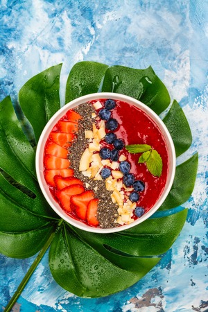 Red smoothie bowlの写真素材