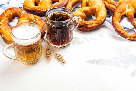 Beer and pretzels on whiteの写真素材