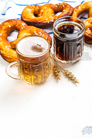 Beer and pretzels on whiteの写真素材