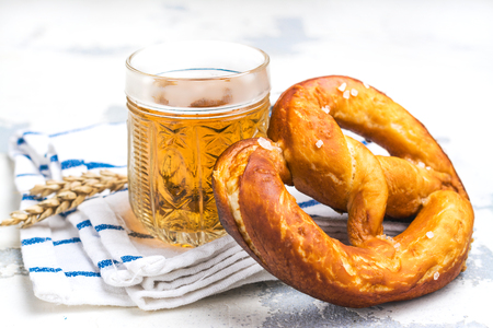 Beer and pretzels on whiteの写真素材