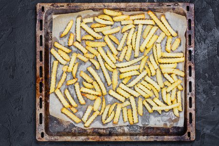 French fries on baking sheetの写真素材