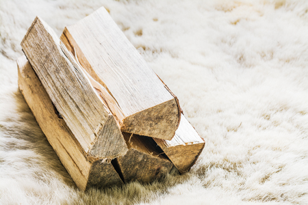 Logs on white fur backgroundの写真素材