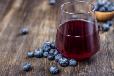 Fresh blueberry juice with berriesの写真素材