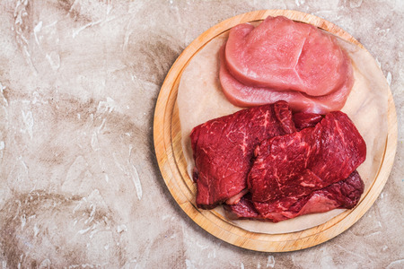Raw turkey breast and beef meatの写真素材