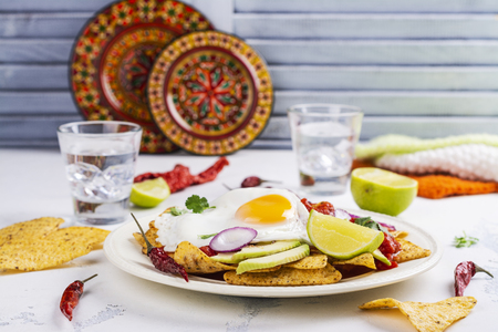 Mexican breakfast - chilaquiles dishの写真素材