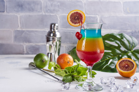 Summer rainbow layered cocktailの写真素材