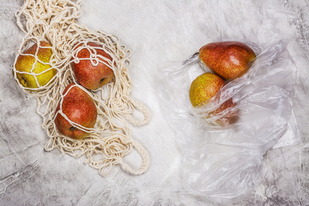 Fresh pears in a mesh bagの写真素材