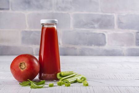 Fresh oranic tomato and celery juiceの写真素材