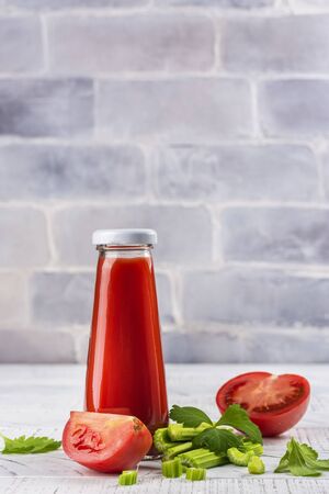 Fresh oranic tomato and celery juiceの写真素材