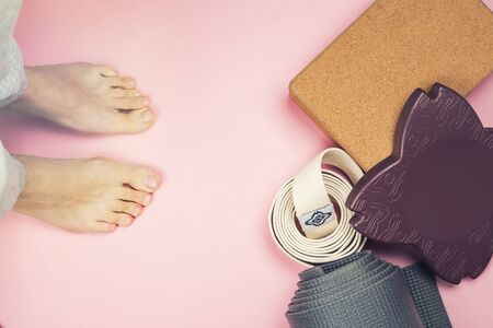 Yoga set accessories on pink backgroundの写真素材