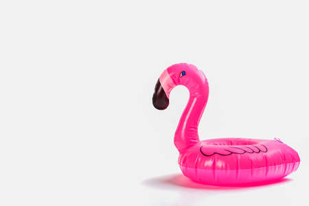 Inflatable flamingo ring on white background. Copy spaceの写真素材