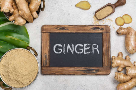 Ginger powder and fresh rootの写真素材