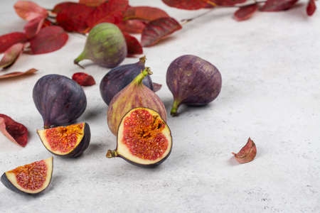 Whole and cut fresh figsの写真素材