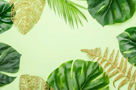 Golden painted tropical leaves