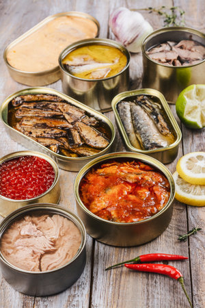 Fish, seafood preserves in cansの写真素材