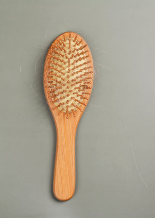Many hair fall after combing in a hairbrushの写真素材