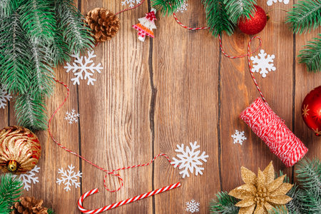 Christmas background with pine cones and fir tree branchesの写真素材