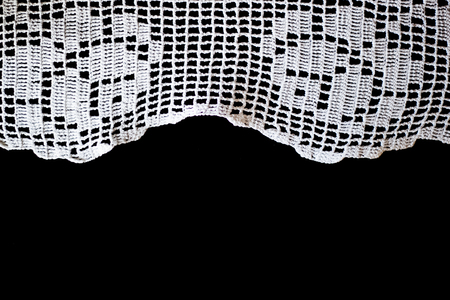 Handmade, white crochet, embroidery, on a black background, contrastの写真素材