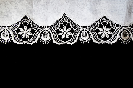 Handmade, white crochet, embroidery, on a black background, contrastの写真素材