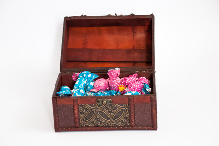 Treasure box chest full of bonbons, fully openedの写真素材