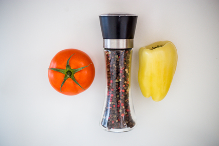 Tomato, pepper, pepper on a white backgroundの写真素材