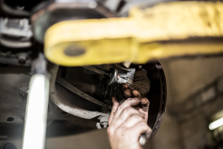 Car brake disc with no point, mechanic checks to see if everything is fine, car serviceの写真素材