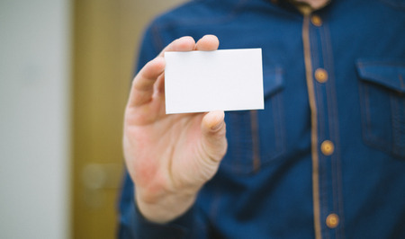 Bank card, business card, businessman holds card in hand, finances, jobs